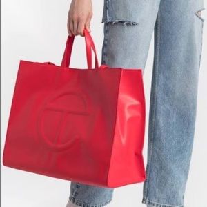 LIKE NEW Red Large Telfar Bag, used 1 time but in perfect condition.